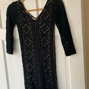 Women’s black mini dress with nude underlay!